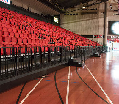 KFC Yum! Center with Irwin Seating Millennium and Marquee chairs and  telescopic platforms with nose mount seating